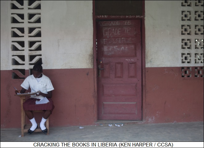 cracking the books in Liberia